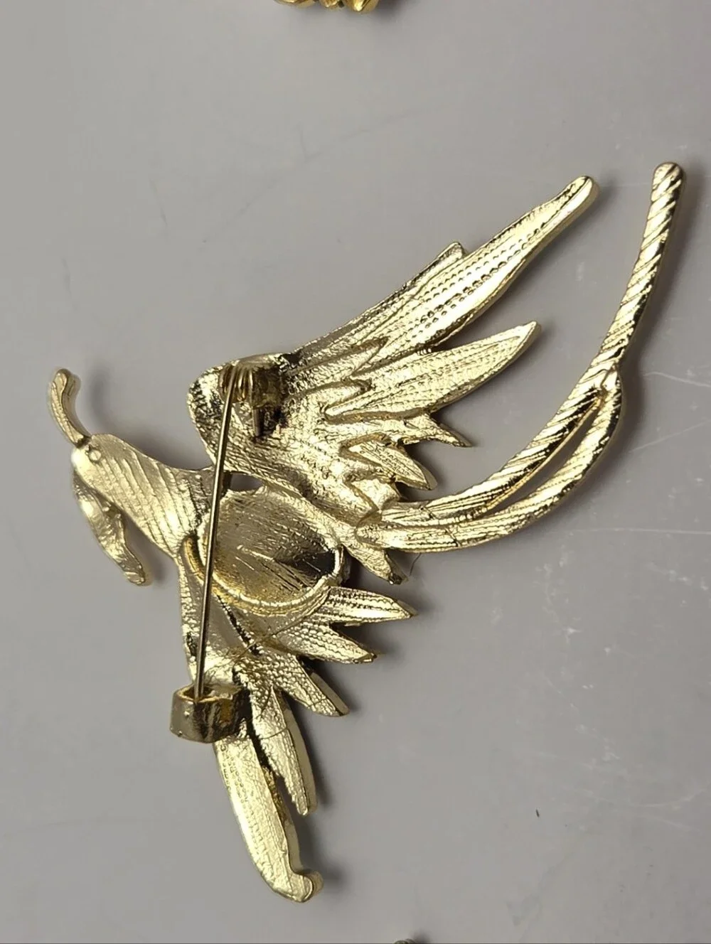 Gold-Tone Multicolor Bird Brooch with Red Center Gem
